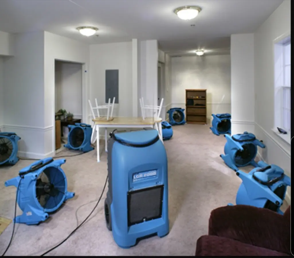 Air movers and dehumidifier setup for Water Extraction & Removal in Winchester